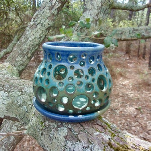 Wheel thrown and carved beach luminary