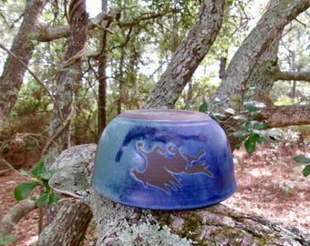 The wild horses of Corolla gallop around the outside of this  sweet little cereal/soup bowl
