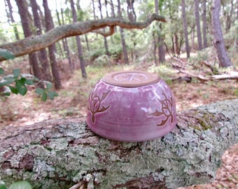 Peace turtles swim through the unusual mauve glaze of this sweet little bowl