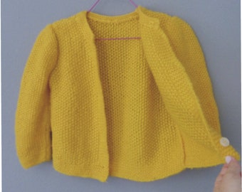 70s girls cardigan 8  -9 years old. Wool & synthetic,thick yellow long sleeve sweater, handmade in Greece. In a very good vintage condition.
