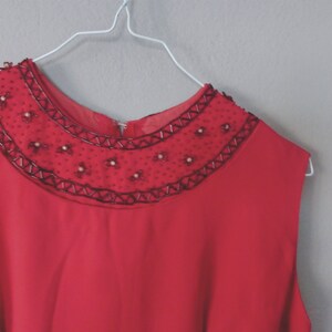 70s classy dress. S size. Red taffeta dress beautifully embroidered on neckline & finish, fully lined. In a very good vintage condition.