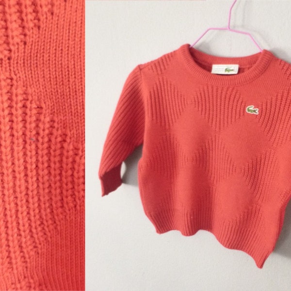 80s Lacoste unisex kids sweater. 4 years old. Red long sleeve wool/acrylic loose pullover, made in France. In a very good vintage condition.
