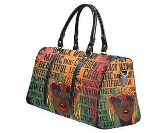 May include: A colorful duffel bag featuring a graphic of a Black woman wearing heart-shaped sunglasses and gold hoop earrings. The bag has black handles and the words "Black Woman" and other empowering words.