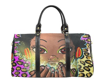 May include: A duffel bag featuring a vibrant illustration of a young person with dark skin, adorned with headphones and a sparkling effect. The bag's design incorporates a leopard print pattern in shades of pink, gold, and black, with black leather handles and trim.