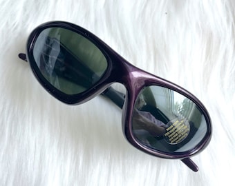 BCBGMAXAZRIA Sunglasses Flawless BLACK MULTI Purple Lenses  display picture 1