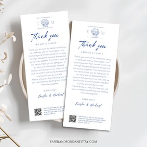 May include: Two white wedding thank you cards with navy blue text. The cards feature a seashell graphic and the words "Thank you" and "Friends & Family." The cards include a QR code and the names "Emilia & Michael."