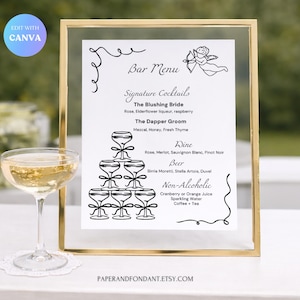 May include: A gold framed bar menu with a champagne glass in the foreground. The menu features a black and white design with the text "Bar Menu" and a list of signature cocktails, wine, beer, and non-alcoholic beverages. The Etsy shop name is at the bottom.