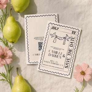 May include: Two white wedding invitations with black text and a decorative border. The invitations read "Save the Date" for Camille & Darren, with the date July 22 in Santa Barbara, CA. The image also includes pears and pink flowers.