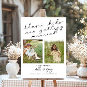 May include: A wedding sign with the text "these kids are getting married!" and two photographs of children. The sign also includes the text "Celebrating Allie & Greg" and the date "April 11, 202X Santa Barbara, CA".