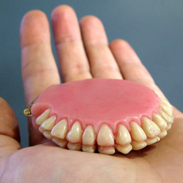 Denture-Inspired, Two Mirror Compact