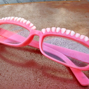 Denture-Inspired Eyeglass Frames image 2