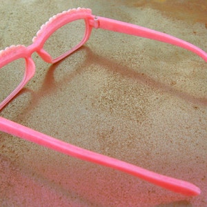 Denture-Inspired Eyeglass Frames image 5