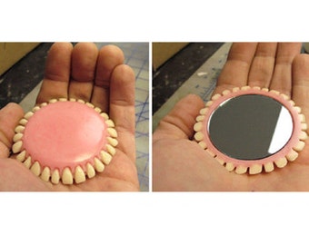 Single Mirror Denture-Inspired Compact