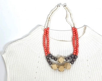 Collier tendance orange : motif géométrique multirang de perles de bois