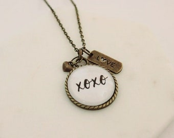 XOXO Glass Pendant Necklace w/Love and Heart Charms 18- or 24-inch Chain Antique Bronze