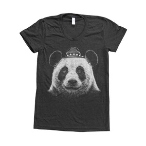 May include: A dark heather grey women's t-shirt featuring a white graphic of a panda wearing a cowboy hat.