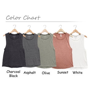 May include: Color chart showing five sleeveless shirts in different colors: charcoal black, asphalt, olive, sunset, and white.