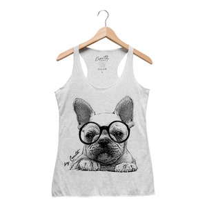 May include: A gray tank top with a black and white illustration of a French bulldog wearing round glasses. The text "by Couth" is printed on the bottom left of the image.
