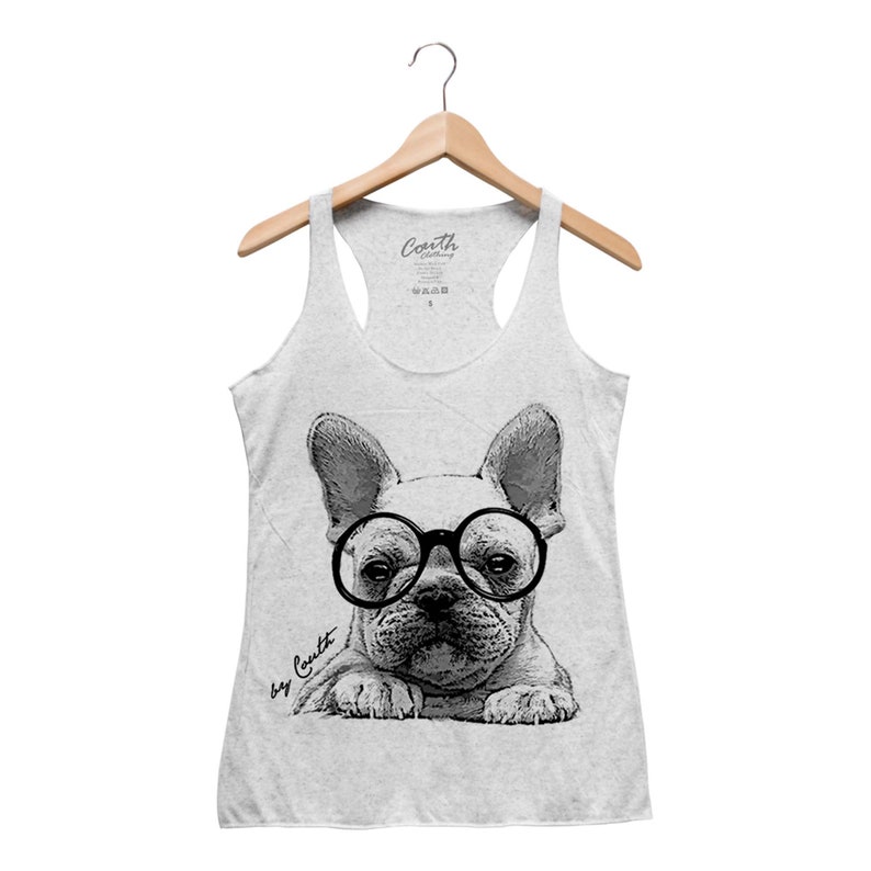 May include: A gray tank top with a black and white illustration of a French bulldog wearing round glasses. The text "by Couth" is printed on the bottom left of the image.