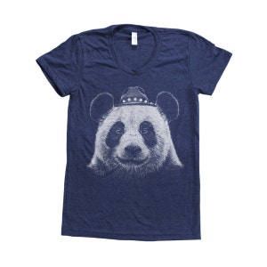 May include: A navy blue t-shirt featuring a white graphic of a panda wearing a cowboy hat.