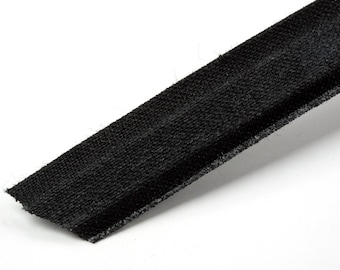 Cotton covered polyester boning. 12mm wide. Black