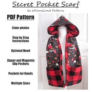 May include: A red and black plaid fleece scarf with a black and white print of camping scenes. The scarf has a hood and multiple pockets, including zipped and magnetic slip pockets. The text "Secret Pocket Scarf" and "PDF Pattern" is visible on the image.