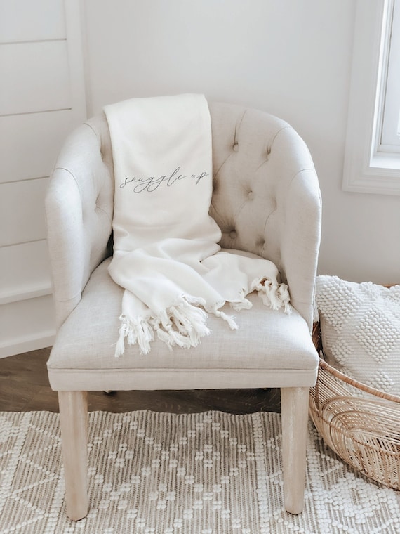Snuggle outlet throw blanket