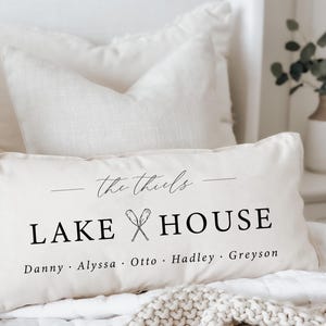 May include: A red ceramic mug with a white handle and a glossy finish. The mug features a black and white illustration of a cat with the text "Meow". The mug is approximately 4 inches tall.