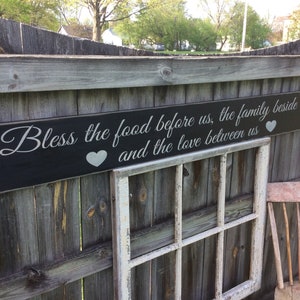 S 852 Wood, Handmade, Sign. “Bless the food before us, the family beside us and the love between us,” Measures 60&quot; x 7 1/2&quot; x 3/4&quot;  Home