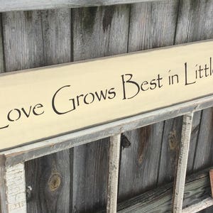 S 124 Wooden, Handmade, Long Signs. "Love Grows Best in Little Houses". 40 x 5 1/2 x 3/4.  Great saying. Country, primitive, antiqued sign.