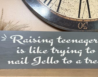 Handmade Wood Sign: Raising Teenagers Quote (18 x 5.5")