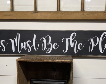 S 874 Handmade, Wooden, Long Sign. "This Must Be The Place".  44 x 7 1/2 x 3/4. Family, friends, neighbors. Rustic.