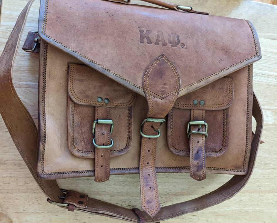 kappa alpha psi luggage