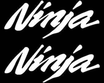 May include: Two white stylized "Ninja" logos on a black background. The logos are in a bold, cursive font.