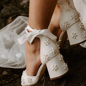 Ivory Leather Bridal Shoes with Low Block Heels and hand embroidered pearl flowers. Melody Low Heels