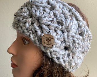 May include: Gray crocheted headband with a wooden tag that says "Campfire Mountain".