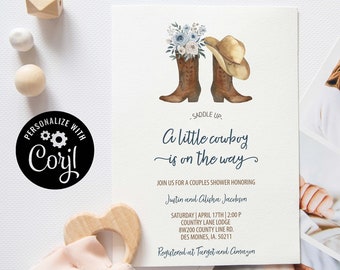May include: A baby shower invitation with a watercolor illustration of cowboy boots and a hat with blue flowers. The text reads "Saddle Up, A Little Cowboy is on the Way".