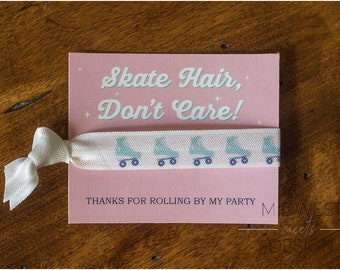 May include: Pink card with the text "Skate Hair, Don't Care!" and a white elastic hair tie with a row of blue roller skates printed on it. The card also says "Thanks for rolling by my party".