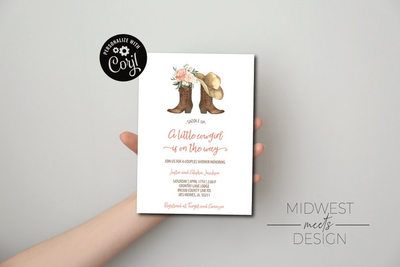 May include: A white invitation card with a watercolor illustration of two cowboy boots with a pink flower bouquet and a cowboy hat. The text on the card reads "Saddle Up, A little cowgirl is on the way." The invitation is for a couples shower honoring Justin and Chelsea Jacobson. The date, time, and location of the shower are listed on the card. The card also includes the text "Registered at Target and Amazon".