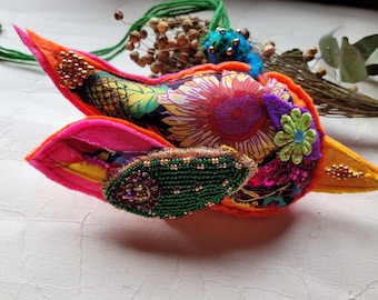 3D  textile bird made from felt, with decor in fabric, and beads