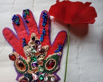 textile decorative hand, with beads, pin