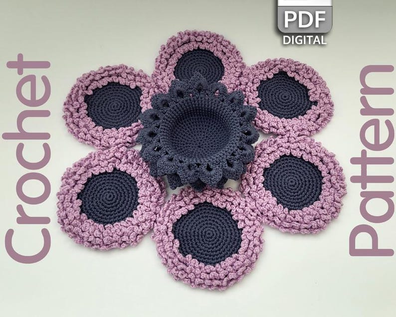 May include: A crochet flower pattern with six purple and gray coasters and a center piece. The pattern is available as a digital PDF download.
