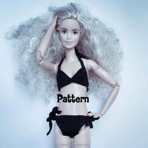 May include: A crochet bikini pattern for a doll. The bikini is black and has a halter top and a bottom with ties on the sides. The pattern is written in English.