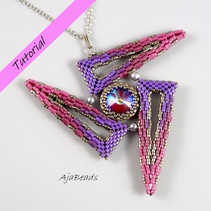 May include: A geometric pendant necklace with a purple and pink beaded design. The pendant features a large iridescent crystal in the centre. The necklace is made with silver chain and has a silver clasp. The pendant is approximately 7.5 cm in length.