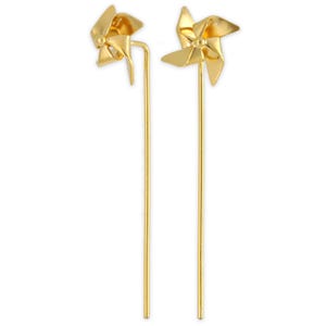 May include: A pair of gold-coloured pinwheel earrings. Each earring features a small, three-dimensional pinwheel design at the top, connected to a long, slender post. The earrings are set against a plain white background.