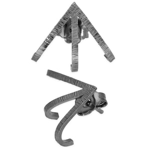 May include: A pair of black triangle shaped earrings with a textured finish. The earrings are made of metal and have a post back.