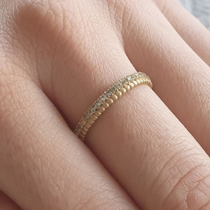 Artisan Gold Eternity Band - Blue Sapphire Accents