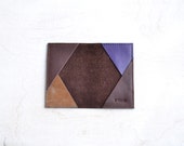 choc brown leather card holder with different coloured triangles inside and teal painted edges / Oyster card holder