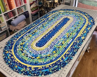blue and yellow jelly roll rug