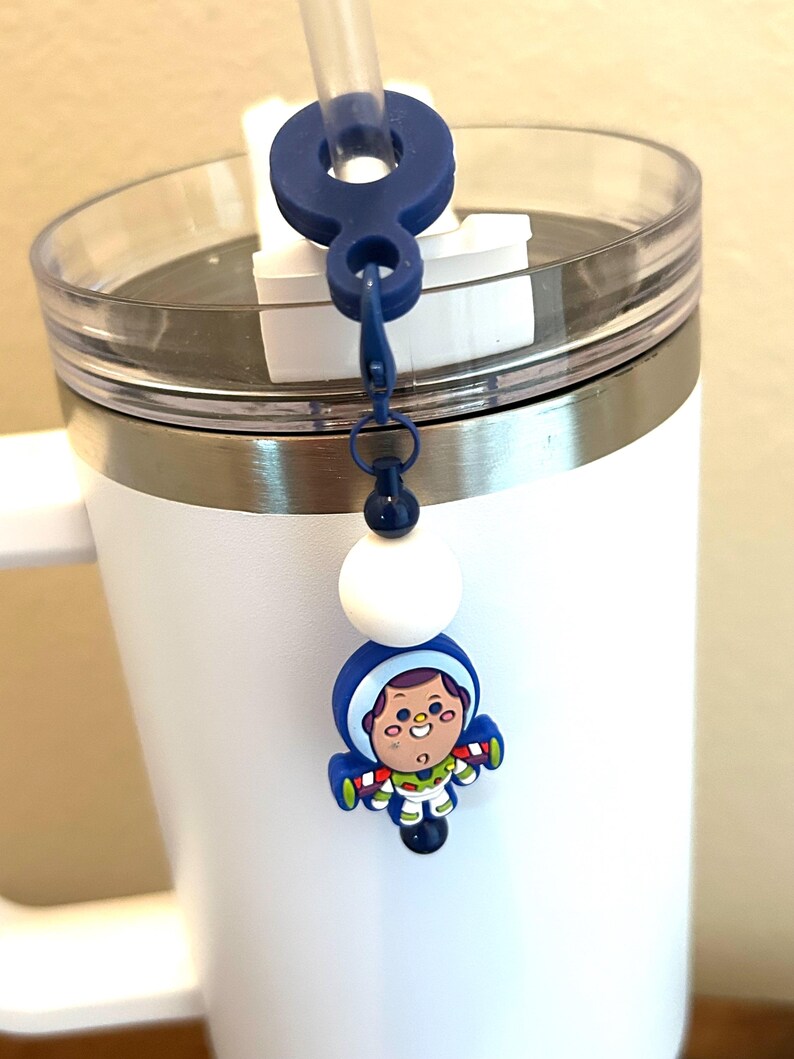 May include: A set of three ceramic nesting bowls in shades of blue, green, and white. The bowls feature a speckled glaze and a simple, modern design. The largest bowl measures approximately 6 inches in diameter.